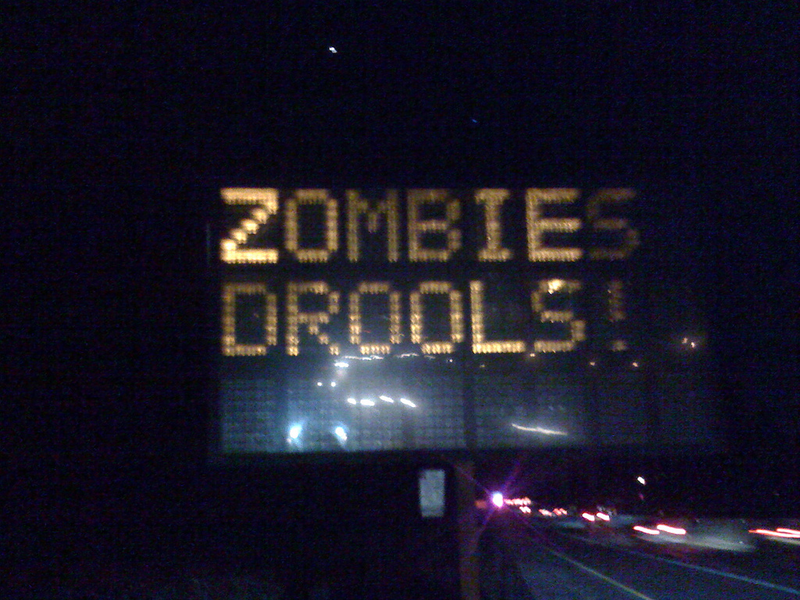 Illustration for article titled Jalopnik-Hacked Road Sign: We're All Going To Jail Now